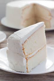 White Wedding Cake Delicious White Cake With White Buttercream Icing Tastes Like Wedding Cake Recipe White Wedding Cake Recipe Wedding Cake Frosting Recipe