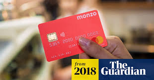 Completed loan agreement form and attached passport photo. Digital Bank Monzo Becomes Britain S Best Rated Lender Banking The Guardian