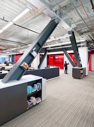 Design Blitz Finishes Comcast Office In Red Corporate Interiors Commercial Design Innovation Centre