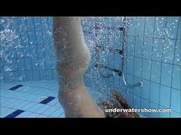 Cute lucie is stripping underwater. Zuzanna Is Swimming In Pantyhose In The Pool