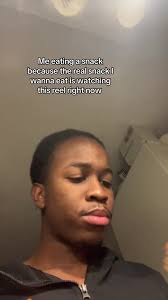 Eating a Snack While Watching Entertaining Reels