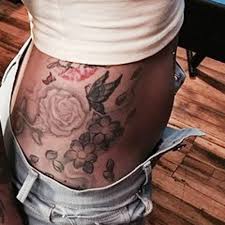Black and gray tattoos featuring roses. Katrina Jackson S 9 Tattoos Meanings Steal Her Style