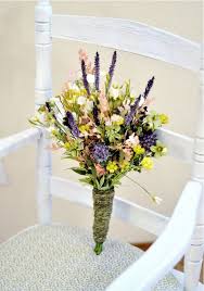 We love these natural flowers that can be reused over and over in other arrangements after the wedding! Server Managed By Showit Wildflower Bouquet Wildflower Wedding Bouquet Hobby Lobby Flowers