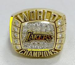 There is a removable top that reveals all the retired los angeles lakers jerseys with a special emphasis on the two kobe bryant retired jerseys. 2000 Los Angeles Lakers Nba World Championship Ring Buy And Sell Championship Rings