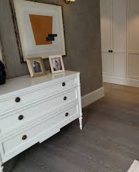 Engineered Oak Wood Flooring Finished With A Grey Oil Creates A Stylish Floor In This Contemporary Bedroom In 2020 Oak Wooden Flooring Stylish Flooring Wood Floors