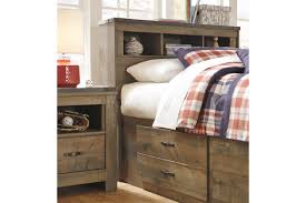 Wheeled under bed storage unit with 2 dividers. Trinell Twin Bookcase Bed With 2 Storage Drawers Ashley Furniture Homestore