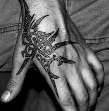 The reason these are so popular is due to the people that are carrying such tattoos are not only normal but celebrities and wwe superstars have tribal tattoos in bulk. Top 41 Tribal Hand Tattoo Ideas 2021 Inspiration Guide