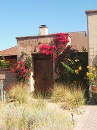 Adobe bricks are cubic building blocks that look like they were made of small pale red bricks. Tucson Adobe Brick Home At Its Finest