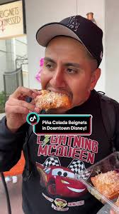 These Piña Colada beignets are a must try! 🔥🔥🔥🔥 #disneyfoodie  #disneyfood #disneyparks #disneytiktok #beignets