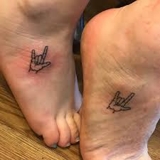 Right wrist i love you sign tattoo for girls. Matching Mother Daughter Tattoo Ideas You Ll Both Love More