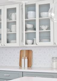 Cliqstudios Dayton Painted White Shaker Cabinets Complete The Breakfast Nook And Beverage C Inside Kitchen Cabinets Paint Inside Cabinets Grey Kitchen Cabinets
