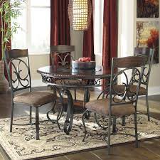Table with inset glass top and one fixed lower shelf. Ashley Signature Design Glambrey D329 15 4x01 Round Dining Table And 4 Chair Set With Metal Accents Dunk Bright Furniture Dining 5 Piece Set
