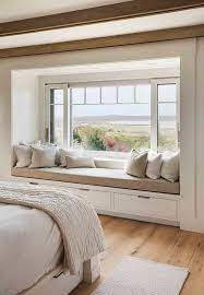 Twin beds are great for small bedrooms, because you can fit the bed in a corner to allow space for your slipper rest and circulation, as has been done here. Bright Bedroom With Amazing Relaxing Place And View Painters Decorators Builders Tilers London Bedroom R Home Decor Bedroom Home Bedroom Bedroom Design