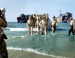 World War II in the Philippines - General Douglas MacArthur with General  Richard Sutherland (left) and Colonel Lloyd Lehrbas (far left) wading  ashore at 'Blue Beach', Dagupan, on the island of Luzon,