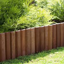 The stakes will help to line up the string straight and level. Specrite 2m Merbau Tapered Garden Border Roll Bunnings Australia