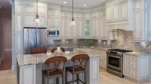 We are having a granite backsplash installed (along w/ the countertops), they made templates, and marked where existing outlets are on the old wall. Solid Slab Backsplash Everything You Need To Know