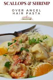 Shrimp And Scallops With Orange Cream Sauce Over Fettuccini Recipe Cream Sauce Scallop Recipes Pasta Pasta Recipes