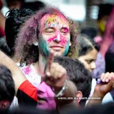 Revellers have fun time during the Holi party, held at Park Hotel, in the  city