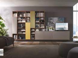 Mobile Da Soggiorno Sospeso Con Libreria A Giorno Con Ante E Basi Sporgenti Arredamento Soggiorno Moderno Idee Arredamento Soggiorno Arredamento