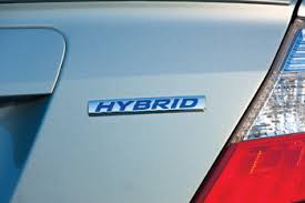 Shielding bolted to the undercarriage of a honda petrol engine tell you the vehicle is a hybrid. Servicing Honda Civic Hybrid Vehicles Underhoodservice