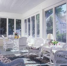 From screen window replacement to new home construction, scenix porch windows with retractable screens are the perfect way to stretch out the seasons and enjoy a comfortable space, free from bugs and other unpleasant elements. Enclosed Add On Salvaged Porch Pale Yellow Wood White Trim White Wicker Furniture Rocker Dining Table With Glass Top Chairs With Blue Cushions Table Set Stock Photo Dissolve