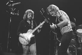 John wanted to show me the finer restaurants of chicago. but there's a problem: The Eagles Joe Walsh And Don Felder 1980