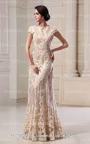 This is a lovely set for a wedding, because it has sparkles and lace for added interest, but the champagne color is both subtle and feminine. Scoop Appliqued A Line Floor Length Champagne Wedding Dress Wedding Dresses For Older Women Wedding Dresses Lace Wedding Dress Champagne