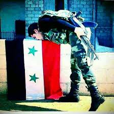 الجندي في هذه الصورة استشهد فتحولت شباب العلم السوري Facebook