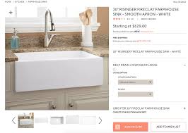 The countertop is made from white quartz and has an undermount. How To Clean A Porcelain Farmhouse Kitchen Sink Andrea Dekker