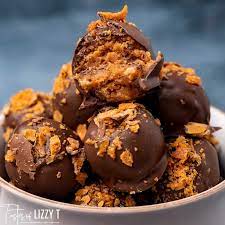Butterfinger Nutter Butter Truffles You Ll Love This Tornado Of Cream C In 2020 Sweet Treats Desserts Strawberry Icebox Cake Recipe Peanut Butter Rice Krispie Treats