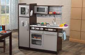 Mother showing cartoon on computer for children while father cooking. Kids Play Kitchens Accessories Kidkraft