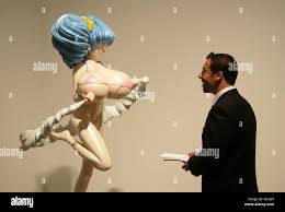A visitor looks at 'Hiropon' (1997), by artist Takashi Murakami, during a  press preview of the exhibition Pop Life: Art in a Material World, at Tate  Modern in London Stock Photo - Alamy
