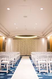 Indoor Hawaii Wedding Venue At The Prince Waikiki Featuring White Folding Chairs And Me Wedding Venues Hawaii Wedding Venue Inspiration Outdoor Wedding Venues