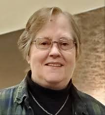 Our fine co-editor and layout artist Susanna Sharp-Schwacke .