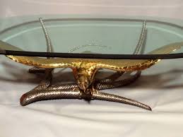 This stunning table was created and carved by a master carver. Eagle Coffee Table By Alain Chervet France Circa 1970