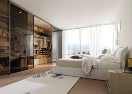 20 Beautiful Examples Of Bedrooms With Attached Wardrobes Dressing Room Design Master Bedroom Closet Design Ideas Bedroom Decor Cozy