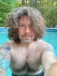 My summer ritual is waking up, pouring a myself a coffee, and immediately  plopping into the pool to marinate until the caffeine kicks in and I can  begin my writing day. If