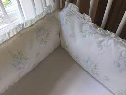 From the zinnia rose nursery collection. Shabby Faded Blue Cabbage Rose Ruffled Crib Bumpers