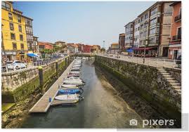 Alan, red, and smitty spend high summer on the jersey shore roving the boardwalk and getting into trouble. Boats Moored In The Harbor At Low Tide In Llanes Asturias Spain Poster Pixers We Live To Change