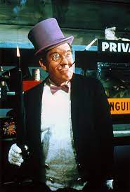 The penguin watched from a tv screen while the poodle lady was in an igloo. The Penguin Dozierverse Batman Wiki Fandom