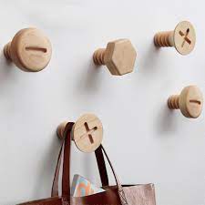 These Clever Wall Hooks Look Like Gigantic Screw Heads Home Decor Hooks Hanger Wall Wood Hooks