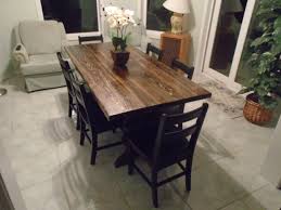 Solid Wood Trestle Table With Six Farm Style Black Chairs The Table Is Solid Douglas Fir Dining Table Black Painted Kitchen Cabinets Colors Rustic Dining Room