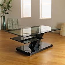 Stylish coffee table with the golden frame they designed the glass table shown above, which not only provides you with a stable storage area on which you can present a vase with magnificent white lilies. Eden Black Border Glass Coffee Table With Gloss Base Dizajn
