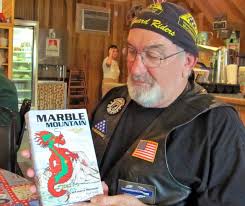 Joe Hare receive author-inscribed copy of Marble Mountain