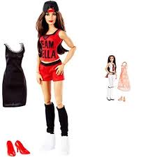 Nikki bella shows off her baby belly in her old wrestling uniform during 'flip the switch challenge' and nikki bella and artem chigvintsev were the latest couple to swap outfits for the short video. Amazon Com Wwe Superstars Nikki Bella Fashion Doll And Wwe Superstar Fashions Brie Bella Action Figure Toys Games