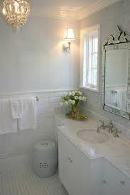 Bring the same bold style to your bathroom by creating a single statement wall with patterned tiles in a neutral hue. Elegant Bathroom Ideas Traditional Bathroom Graciela Rutkowski Interiors