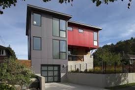 Replacing the exterior siding on your home increases the property value and keeps the interior of the home insulated. Modern Home With Exterior House Metal Roof Material Wood Siding Material And Shed Roofline Photo 3 Modern House Siding House Siding Materials House Siding