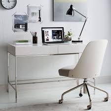 With its lacquer finish, the paterson white desk brings a contemporary meets cottage look to an office space. Lacquer Storage Desk