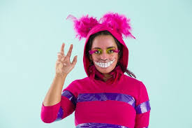 Diy cheshire cat costume + makeup! Get Crazy With This Diy Alice In Wonderland Cheshire Cat Halloween Costume Brit Co
