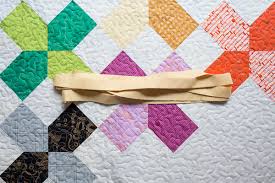 Turn a square of fabric into yards of continuous bias quilt binding the fast and easy way! How To Bind A Quilt Using Double Fold Binding Weallsew